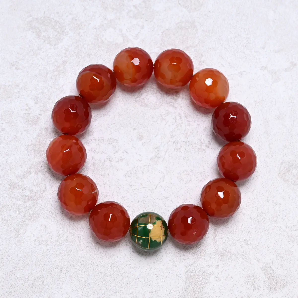 16Mm Carnelian Gemstone Elastic Bracelet With Green Globe Accent Bead 1