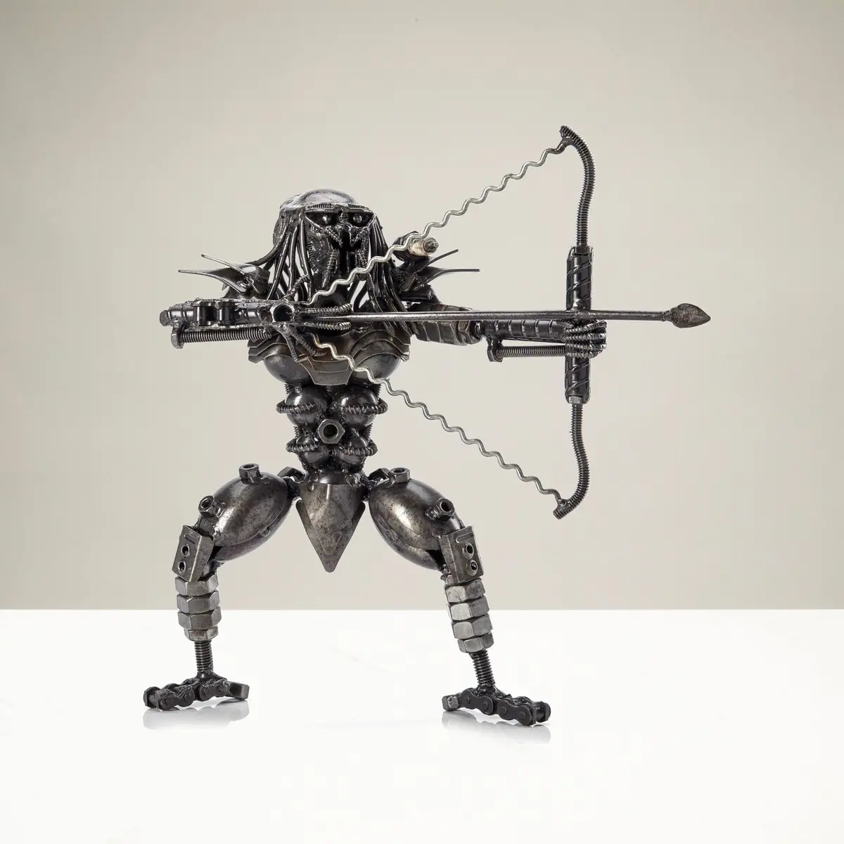 Predator With Bow And Arrow Inspired Recycled Metal Sculpture 1