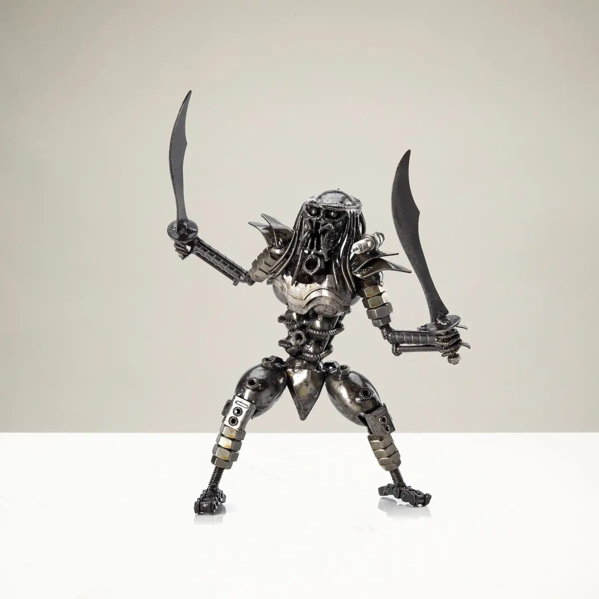 Predator With Dual Wielded Sword Inspired Recycled Metal Sculpture 1